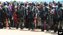 Displaced residents fleeing sectarian violence were cordoned off by military at the airport at Bangui, Central African Republic in late August when the airport was temporarily shut down. 