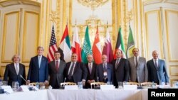 U.S. Secretary of State John Kerry (2nd L) poses for members of the media with foreign ministers of the Gulf Cooperation Council as they meet to discuss Middle East concerns about an emerging nuclear deal with Iran, at the Chief of Mission Residence in Pa