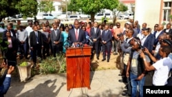 Daniel Chapo, presidential candidate of the ruling Frelimo party addresses the media after casting his vote during the general elections at Inhambane, in southern Mozambique, Oct. 9, 2024.