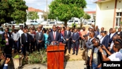 FILE - Daniel Chapo of the ruling Frelimo party addresses the media after casting his vote during the general elections at Inhambane, in southern Mozambique, Oct. 9, 2024.