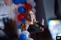 FILE - Congressional candidate Liuba Grechen-Shirley delivers a concession speech in Garden City, N.Y., Nov. 7, 2018.