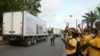 Cortège accompagnant les œuvres de l'aéroport jusqu'à la présidence de la République, Bénin, le 10 novembre 2021. (VOA/Ginette Fleure Adandé)