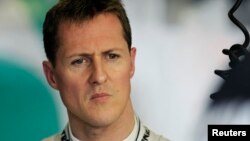 FILE - Mercedes Formula One driver Michael Schumacher is seen during the first practice session of the Australian F1 Grand Prix at the Albert Park circuit in Melbourne, Australia, March 25, 2011. 