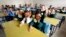 Palestinian students attend class at al-Taea school in Khan Younis, southern Gaza strip, Aug. 23, 2009.