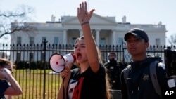 Sofia Hidalgo, 15, of Glenmont, Md., chants during a student protest for gun control legislation in front of the White House, Wednesday, Feb. 21, 2018, in Washington. (AP Photo/Evan Vucci)