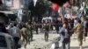 Security forces inspect the site of a suicide attack outside a Shi'ite mosque in Kabul, Afghanistan, Sept. 29, 2017.