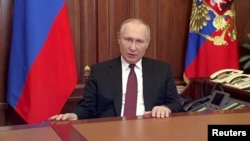 ARHIVA: Ruski predsednik Vladimir Putin u Moskvi objavljuje početak "vojne operacije" u Ukrajini, 24. februar 2022. (Foto: Russian Pool/Reuters TV)