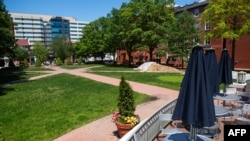 FILE - A view of part of the campus of George Washington University in Washington, May 7, 2020. Torch on the Potomac was established by Chinese international students from the university.