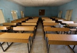 A classroom sits empty at the Government Science School, where gunmen abducted students, in Kankara, in northwestern Katsina state, Nigeria, Dec. 14, 2020.