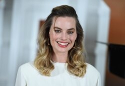 FILE - Margot Robbie at the photo call for "Once Upon a Time in Hollywood" in Los Angeles, July 11, 2019.