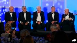 Former Johnson Space Center Director Gerry Griffin, left, a flight director for all of the crewed Apollo missions, sits next to Apollo astronauts Harrison Schmitt, Rusty Schweickart, Walt Cunningham and Tom Stafford, from second from left, during a panel 