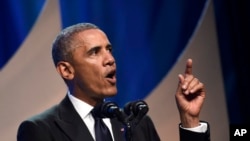 President Barack Obama speaks at the Congressional Black Caucus Foundation’s 44th Annual Legislative Conference Phoenix Awards Dinner in Washington, Sept. 27, 2014.