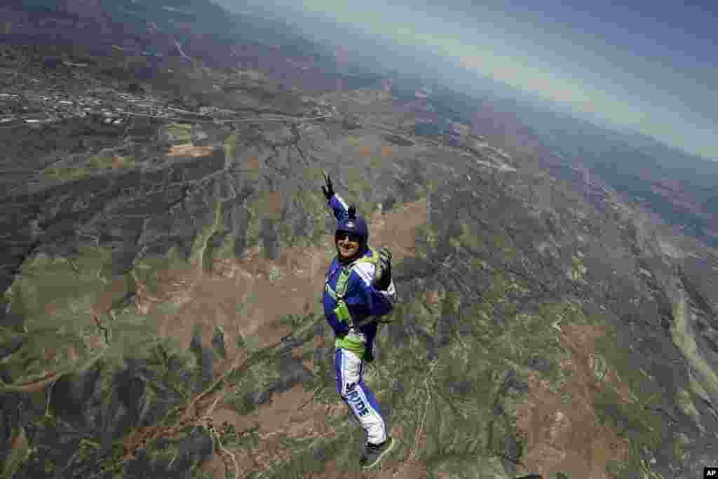 Skydiver Luke Aikins jumps from a helicopter during his training in Simi Valley, California.