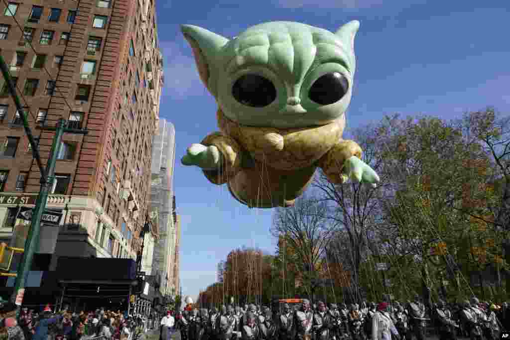 A float depicting &quot;Grogu&quot; moves down Central Park West during the Macy&#39;s Thanksgiving Day Parade in New York.