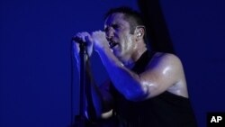 Trent Reznor of the Nine Inch Nails performs on day one of Lollapalooza 2013 at Grant Park in Chicago, Aug. 2, 2013.