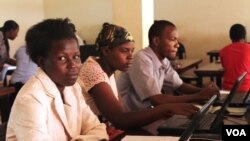 Students learn IT skills for free at a computer lab set up with the help of volunteer hackers in Jinja, Uganda. (Hilary Heuler for VOA)