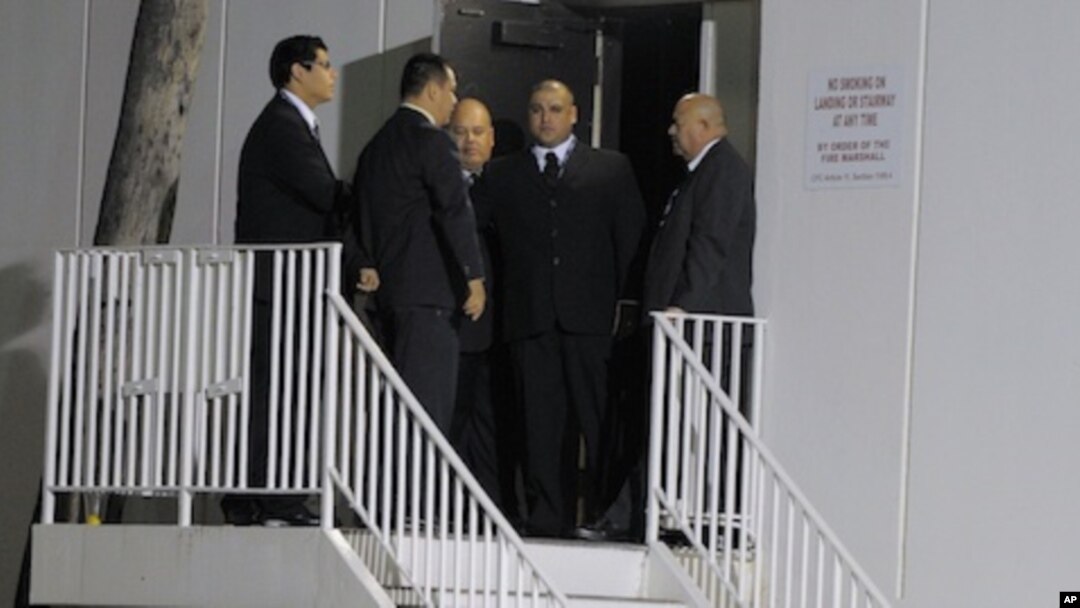 Security is seen at the loading dock outside the Beverly Hilton Hotel Saturday Feb. 11, 2012 in Beverly Hills Calif. Whitney Houston was pronounced dead in her room on the fourth floor of the hotel on Saturday.