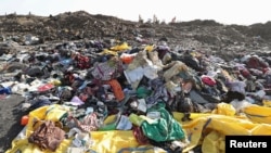 Clothing and personal effects from passengers are seen near the wreckage at the scene of the Ethiopian Airlines Flight ET 302 plane crash, near the town of Bishoftu, southeast of Addis Ababa, March 11, 2019. 