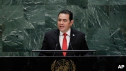 FILE - Then-Guatemalan President Jimmy Morales speaks at the United Nations, Sept. 25, 2019, in New York. Guatemalan journalists interviewed by the Committee to Protect Journalists said conditions deteriorated for them during Morales' time in office.