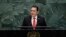 FILE - Then-Guatemalan President Jimmy Morales speaks at the United Nations, Sept. 25, 2019, in New York. Guatemalan journalists interviewed by the Committee to Protect Journalists said conditions deteriorated for them during Morales' time in office.