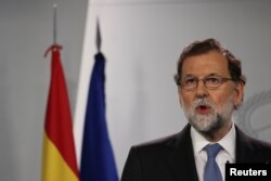 Spain's Prime Minister Mariano Rajoy delivers a statement at the Moncloa Palace in Madrid, Spain, Oct. 27, 2017.