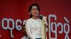 Burma's opposition leader Aung San Suu Kyi speaks during a rally in the central city of Mandalay, May 18, 2014. 