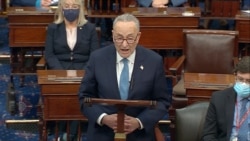 In this image from video, Senate Minority Leader Chuck Schumer of N.Y., speaks as the Senate reconvenes after protesters stormed into the U.S. Capitol on Jan. 6, 2021.
