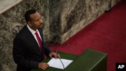 FILE - Abiye Ahmed addresses Ethiopian lawmakers after he was sworn in as the country's prime minister, April 2, 2018. 