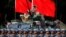 FILE - Troops prepare for the arrival of Chinese President Xi Jinping, June 30, 2017, at the People's Liberation Army Hong Kong Garrison in Hong Kong.