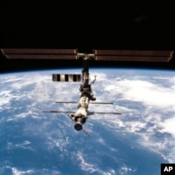 NASA's twin brother astronauts are scheduled to meet up at the International Space Station.