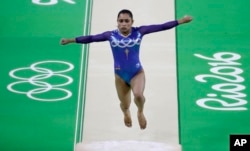 India's Dipa Karmakar performs on the vault during the Artistic Gymnastics Women's Apparatus Final at the 2016 Summer Olympics in Rio de Janeiro, Brazil, Aug. 14, 2016.