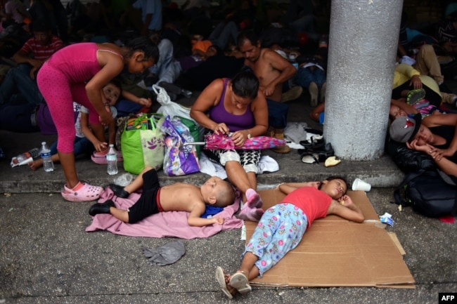 Honduran migrants taking part in a caravan heading to the US, rest in Tapachula, Chiapas state, Mexico, Oct. 21, 2018.