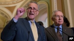 Sen. Charles Schumer, D-N.Y., joined at right by Senate Minority Leader Harry Reid of Nev., criticizes Republican lawmakers for being too tied to the NRA and the gun lobby, during a news conference on Capitol Hill in Washington, Tuesday, June 14, 2016.