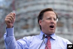 FILE - Rep. Dave Brat, R-Va., speaks during a rally organized by Tea Party Patriots on Capitol Hill in Washington, Sept. 9, 2015, to oppose the Iran nuclear agreement.