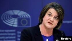 FILE - Northern Irish Democratic Unionist Party leader Arlene Foster holds a news conference at the European Parliament after a meeting with EU Brexit negotiator Michel Barnier in Brussels, Oct. 9, 2018.