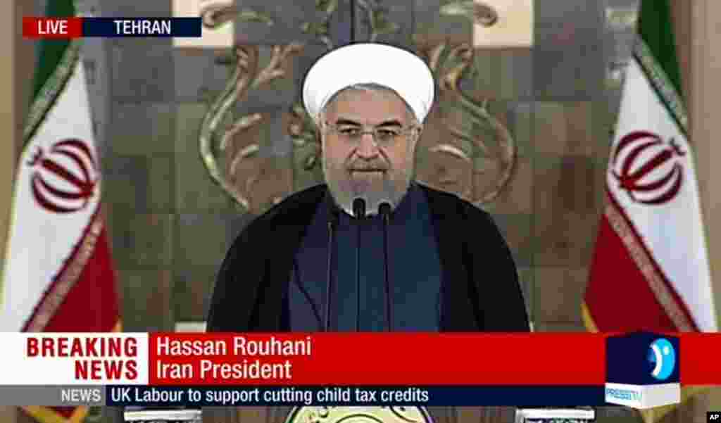 Rais wa Iran Hassan Rouhani akitoa taarifa kupitia televisheni ya taifa akipongeza mkataba kwa kusema &#39;ukurasa mpya&#39; unanaza katika uhusiano na dunai baada ya mkataba kutiwa saini, Tehran, July 14, 2015.