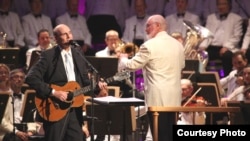 John Williams leading the Boston Pops with James Taylor on July 14, 2012. (Hilary Scott)