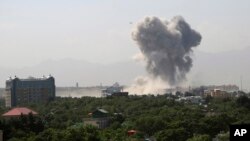 Smokes rises after a huge explosion in Kabul, Afghanistan, Monday, July 1, 2019. Powerful explosion rocks Afghan capital, with smoke seen billowing from downtown area near U.S. Embassy.