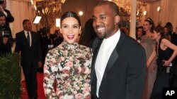 Kim Kardashian and Kanye West attend The Metropolitan Museum of Art Costume Institute gala benefit, "Punk: Chaos to Couture", on May 6, 2013 in New York. 
