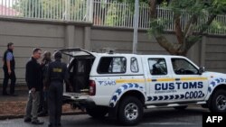 FILE: on April 16, 2018 in Johannesburg., South African officials on April 16 raided a Johannesburg property belonging to the Guptas, the wealthy business family at the heart of graft allegations against former president Jacob Zuma. The Gupta brothers fled the country.