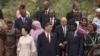 China's President Xi Jinping (C) and his wife Peng Liyuan get ready to pose for a group photograph with leaders from African nations ahead of a dinner reception during the Forum on China-Africa Cooperation (FOCAC) at the Great Hall of the People in Beijin