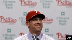 Philadelphia Phillies pitcher Cliff Lee smiles during a baseball news conference, Wednesday, Dec. 15, 2010, in Philadelphia.