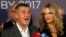 Czech billionaire and leader of ANO 2011 political movement Andrej Babis accompanied with his wife, Monika, addresses the media after most of the votes were counted in the parliamentary elections in Prague, Czech Republic, Oct. 21, 2017. 