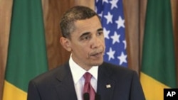 US President Barack Obama makes a statement on the ongoing showdown in Libya, during his news conference at the Palacio do Planalto in Brasilia, Brazil, March 19, 2011