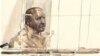 This court sketch in Paris shows Pascal Simbikangwa, a former Rwandan army captain charged with complicity in the genocide that left 800,000 dead, on the first day of his trial, the first of its kind, in France, Feb. 4, 2014.