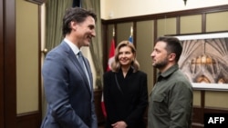 Olena Zelenska at a meeting with Justin Trudeau.  UKRAINIAN PRESIDENTIAL PRESS SERVICE / AFP