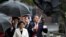 Australia's Defense Minister Richard Marles struggles with his umbrella as Japan's Defense Minister Minoru Kihara and Japan's Minister of Foreign Affairs Yōko Kamikawa look on at the 11thAustralia-Japan 2+2 Foreign and Defense Ministerial Consultation Sept. 5, 2024.