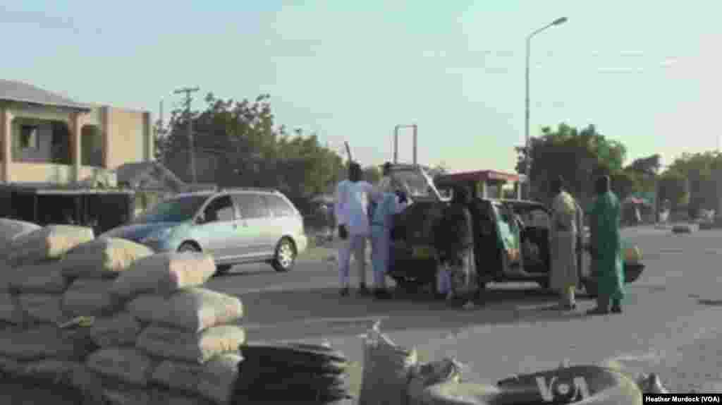 A Civilian JTF check-point in Maiduguri, Nigeria, December 2013. (Heather Murdock for VOA)