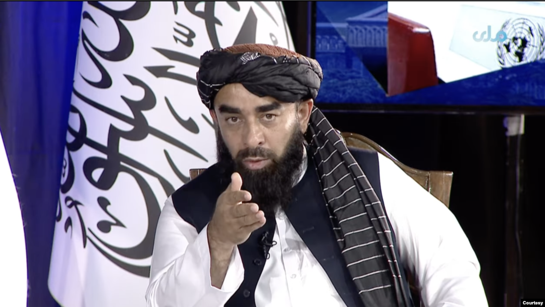 FILE - Taliban spokesperson Zabihullah Mujahid speaking on state-run Afghan broadcaster. (VOA screen shot)