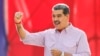 Venezuela's President Nicolas Maduro gestures to supporters during a rally in Caracas, Venezuela, Feb. 27, 2025.